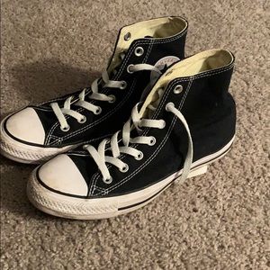 Black high top converse sneakers
